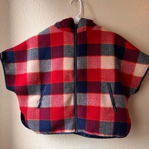 It does run a little big and can fit and adult size small